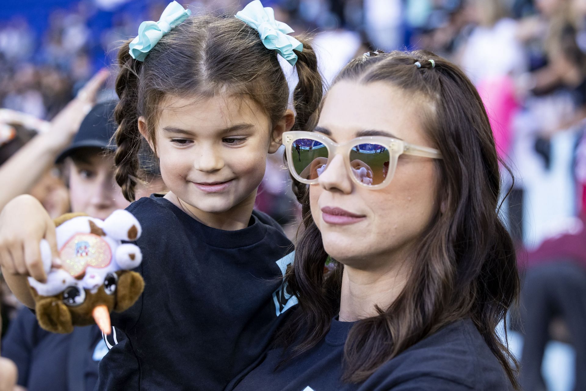 Morgan with her daughter at anOrlando Pride v NJ/NY Gotham FC game (Image Source: Getty)